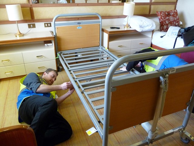 One of our technicians fitting a Casabed in a ships cabin